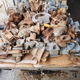 Fixed Base Twist Locks and Assorted Metal Pieces